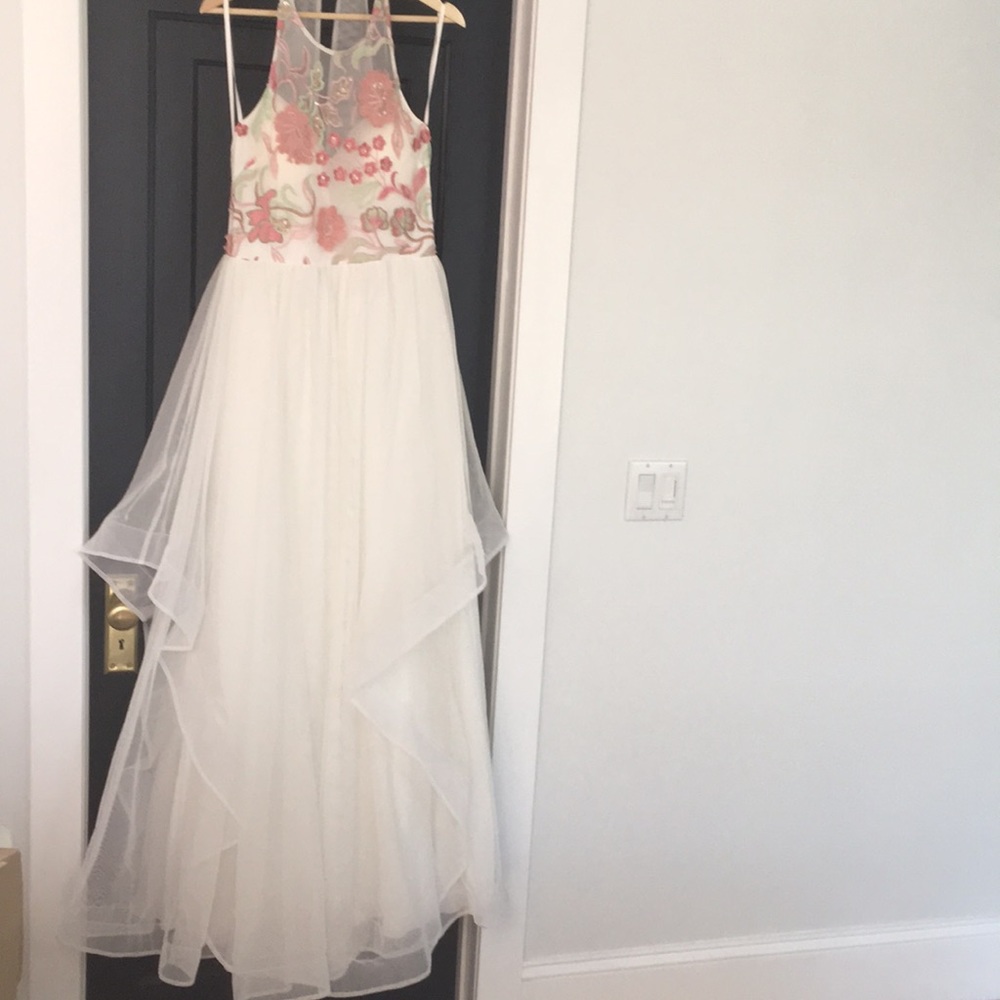 White tulle dress with flower detail